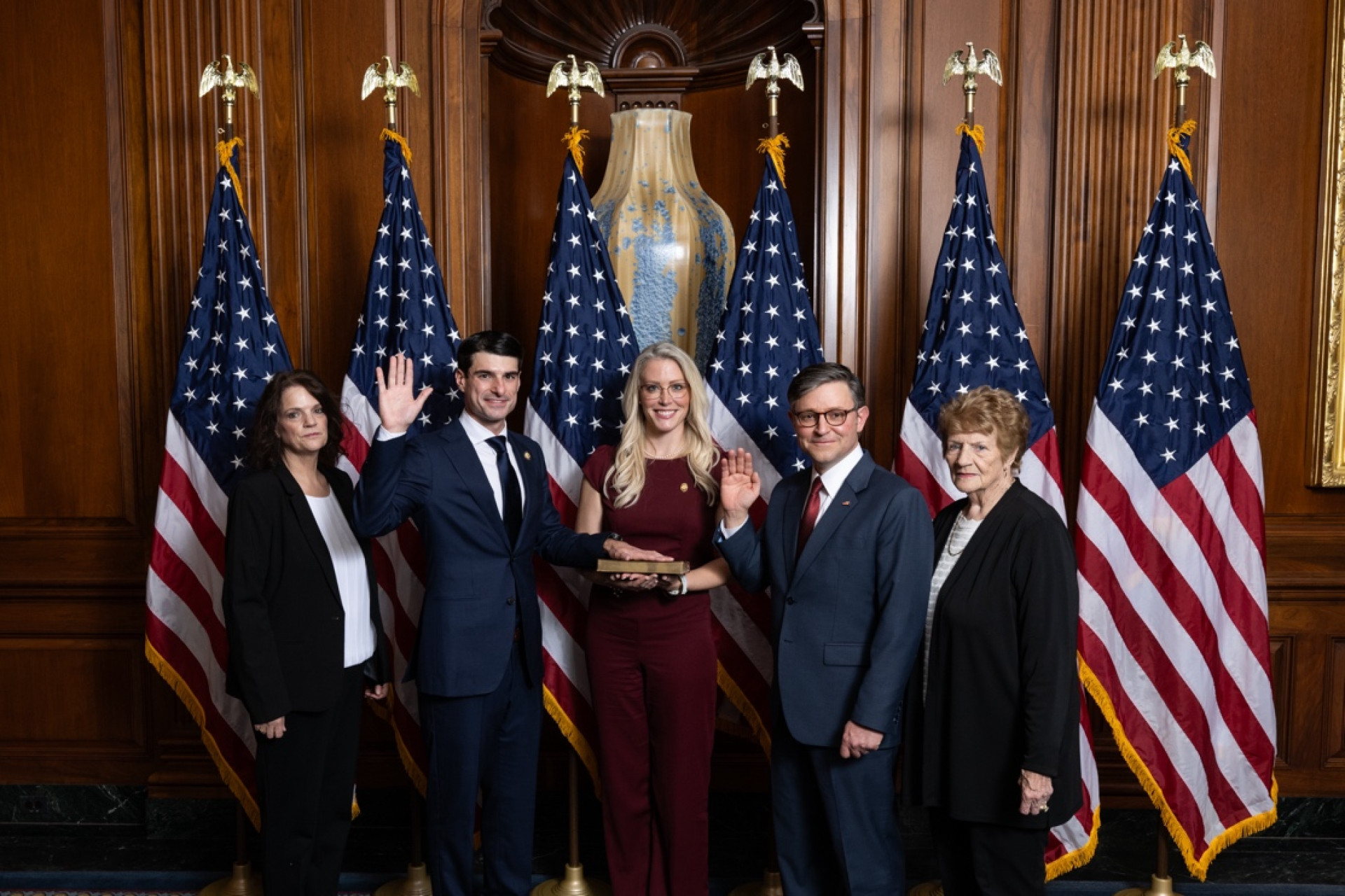 Representative Bresnahan takes the Oath of Office surrounded by family
