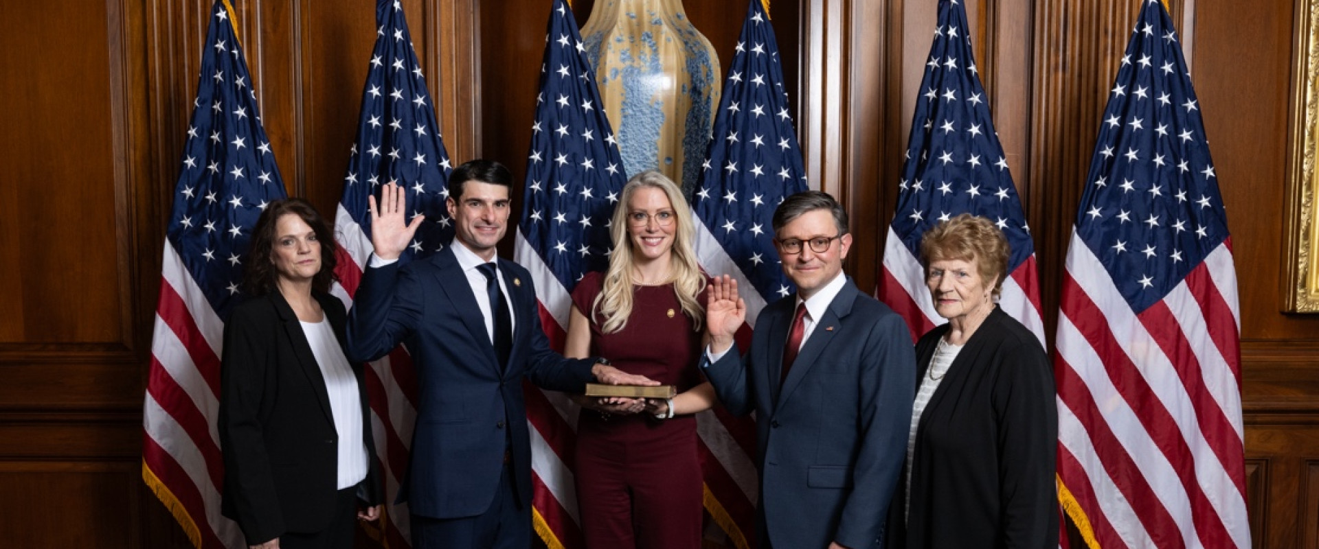 Representative Bresnahan takes the Oath of Office surrounded by family