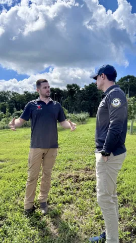 Pictured: Logan Brace gives Rep. Bresnahan a tour of Brace’s Orchard.