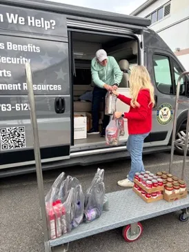 Rep. Bresnahan and wife, Chelsea, donating food
