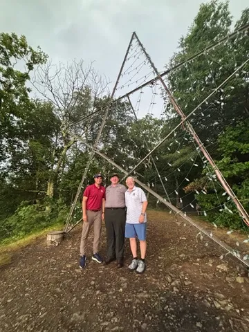 From left: Rep. Bresnahan, Superintendent Leighty, and Commissioner Osterberg at the Milford Star prior to its re-lighting